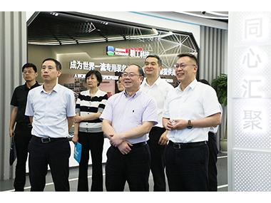 省经信厅副厅长王忠民一行调研精工科技